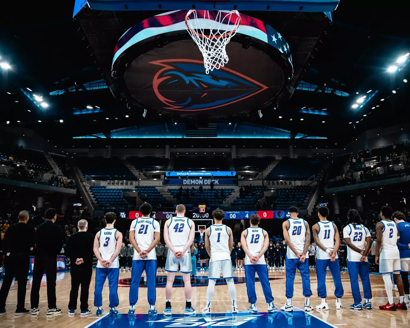 DePaul players stand for the national anthem ahead of the game vs. #7 Marquette.