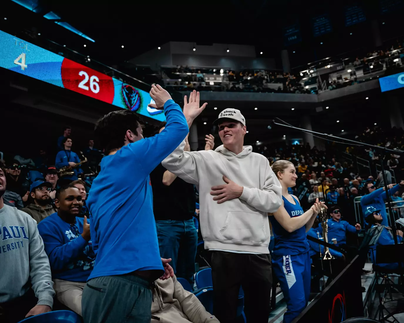 DePaul fans celebrate during game.