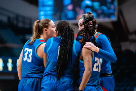The team huddles.