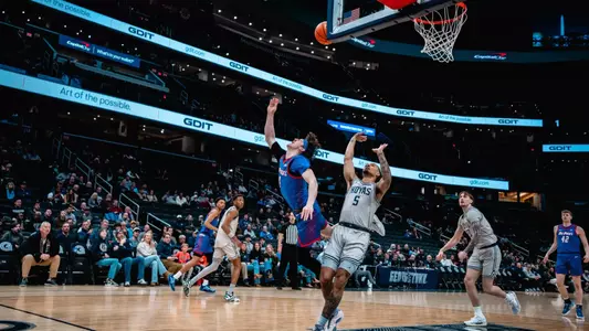 Conor Enright tosses shot up and secures the layup at Georgetown on Friday, Jan. 17