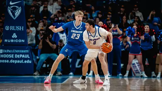 Troy D'Amico surveys the defense.