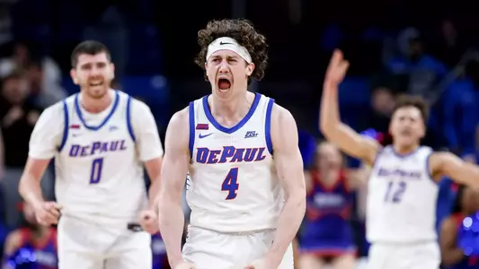 Conor Enright celebrates a Blue Demon basket.