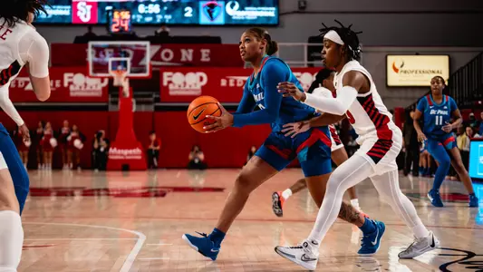 Taylor Johnson-Matthews drives against St. John's
