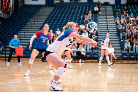 Abby Cahill receives the volleyball