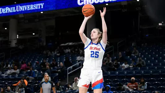 Kate Clarke shoots a three