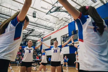 DePaul's hitters group up before taking the court
