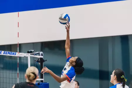 Jade Dudley-Epps jumps up for an attack