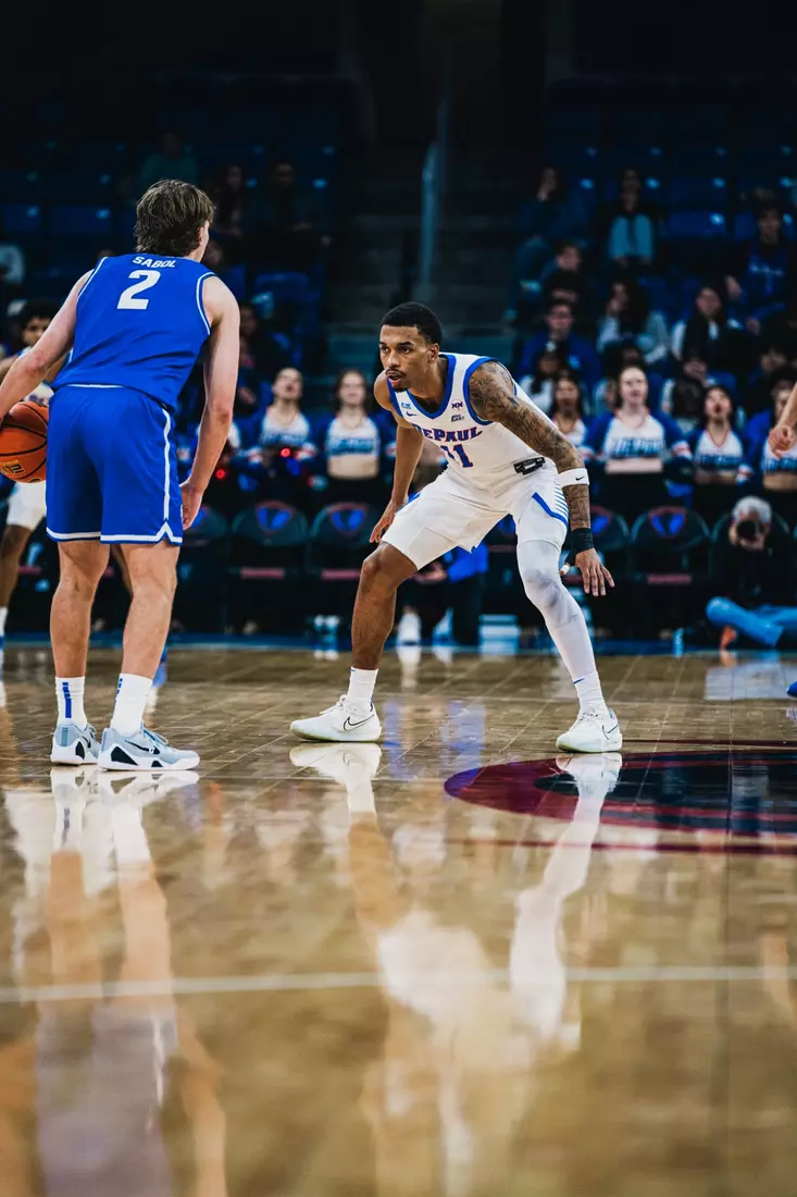 CJ Gunn squares up on defense.