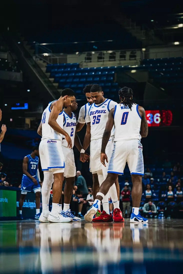 Team huddles in game.
