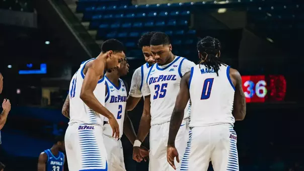 Team huddles in game.