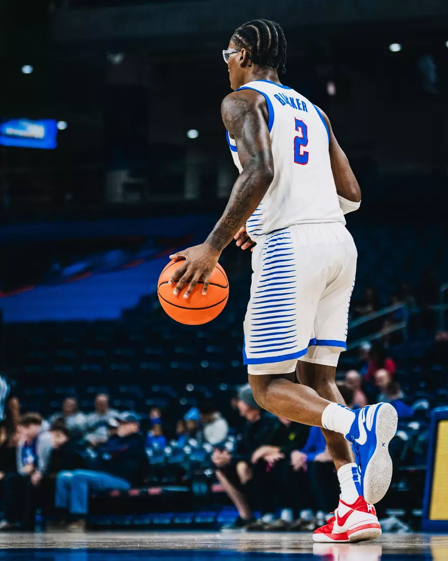Layden Blocker dribbling the ball down the court.