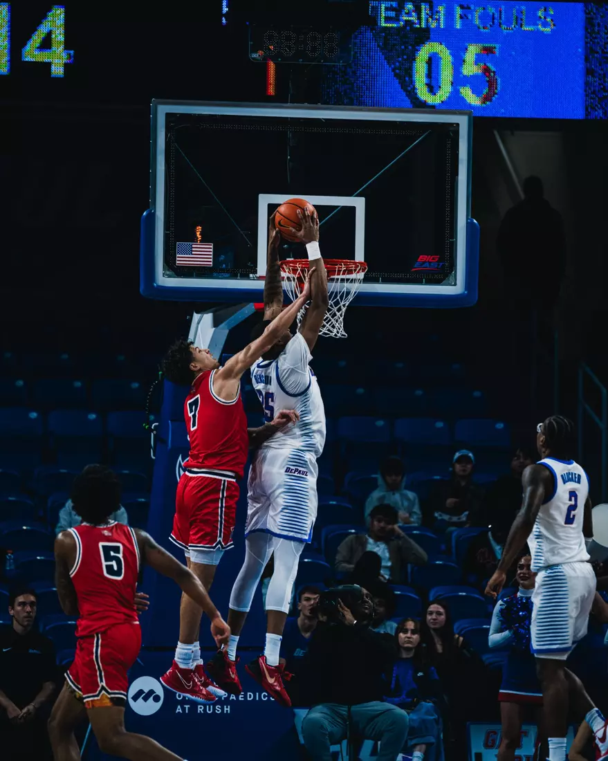 NJ Benson dunking the ball.