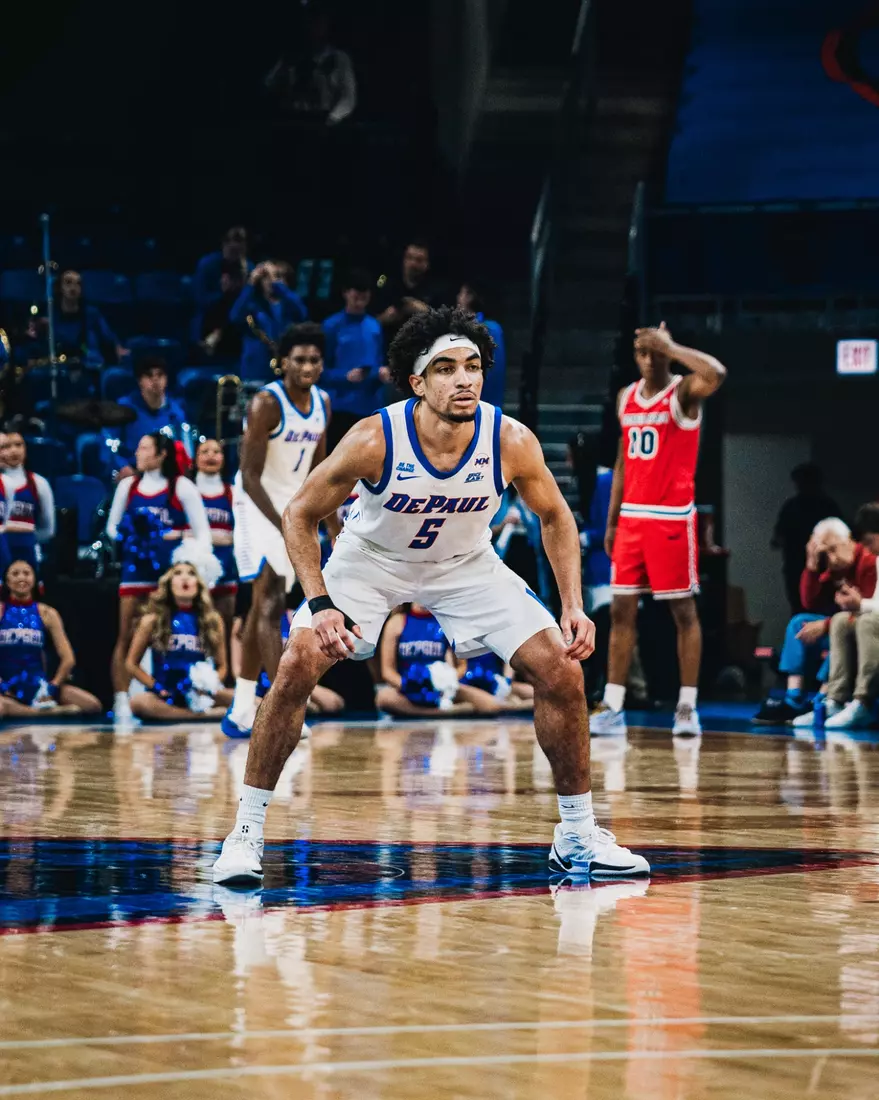 RJ Smith playing defense.