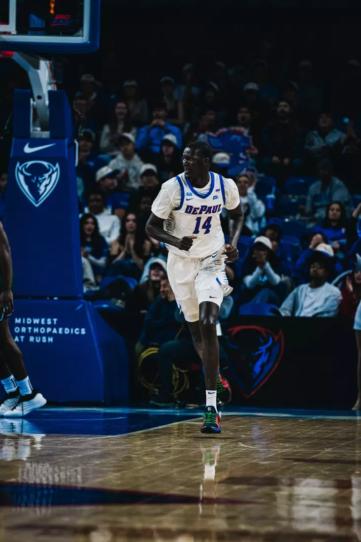 Khaman Maker runs back on defense.