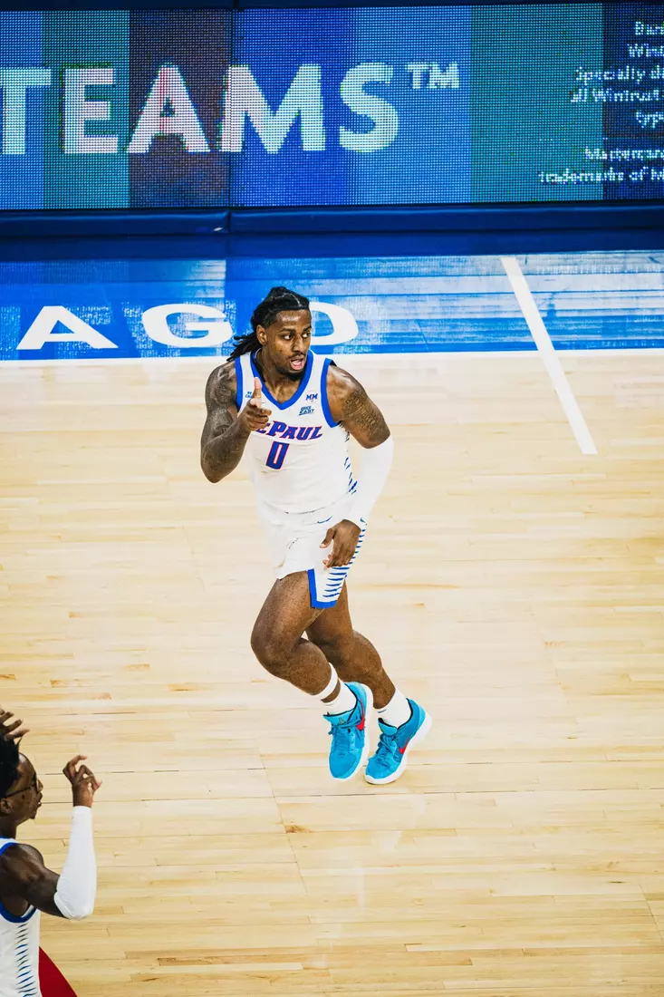 Brandon Maclin celebrates a three pointer.