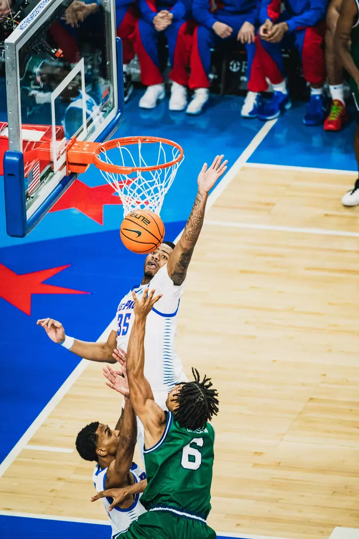 NJ Benson rises for the deflection.