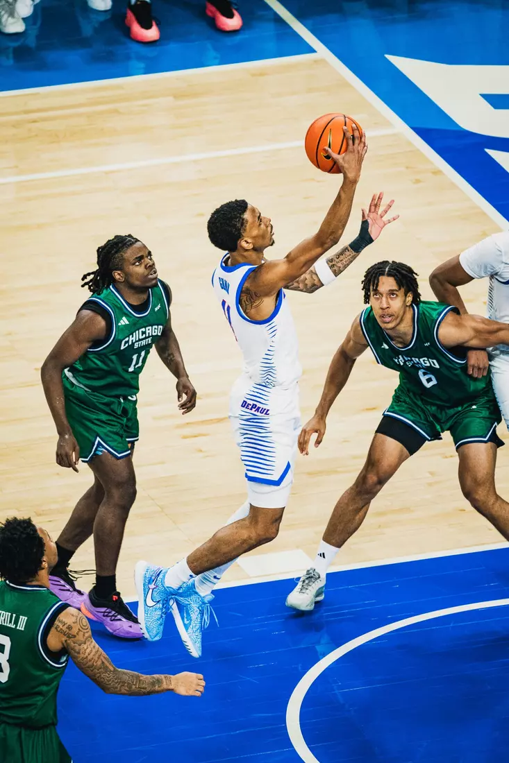 CJ Gunn goes up for a layup.