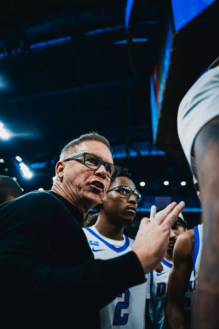 Coach Holtman in the huddle