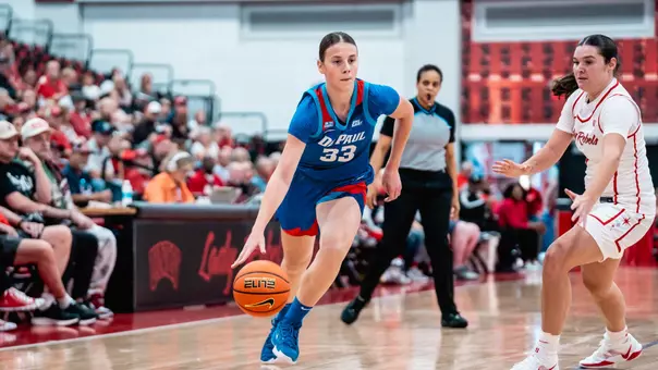 Kate Novik dribbles against UNLV