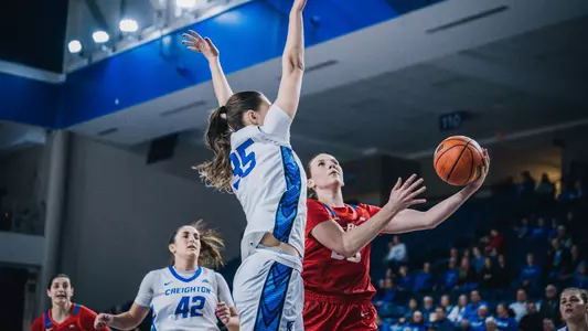 Kate Novik attempts a layup versus Creighton