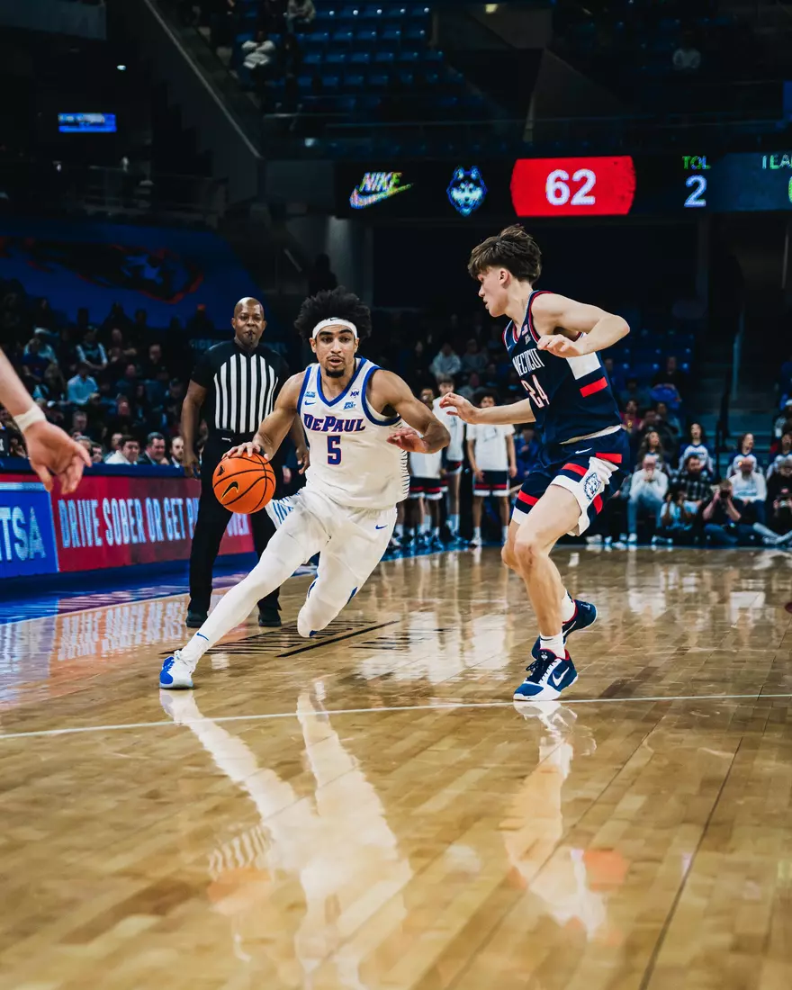 RJ Smith looks to drive in and get a look at the rim.
