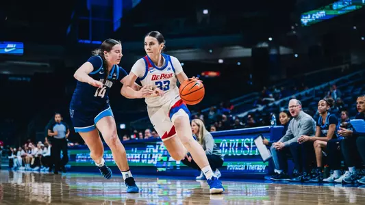 Junior Kate Novik penetrates the Villanova defense.
