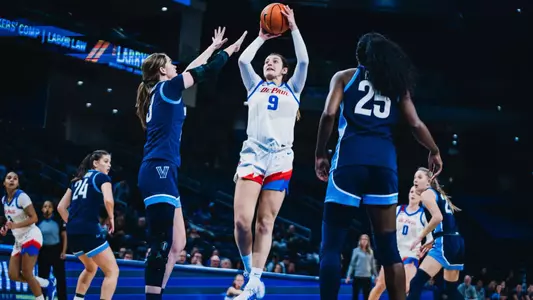 Forward Meg Newman rises up for the jumper.