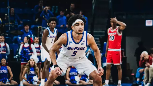 RJ Smith playing defense.