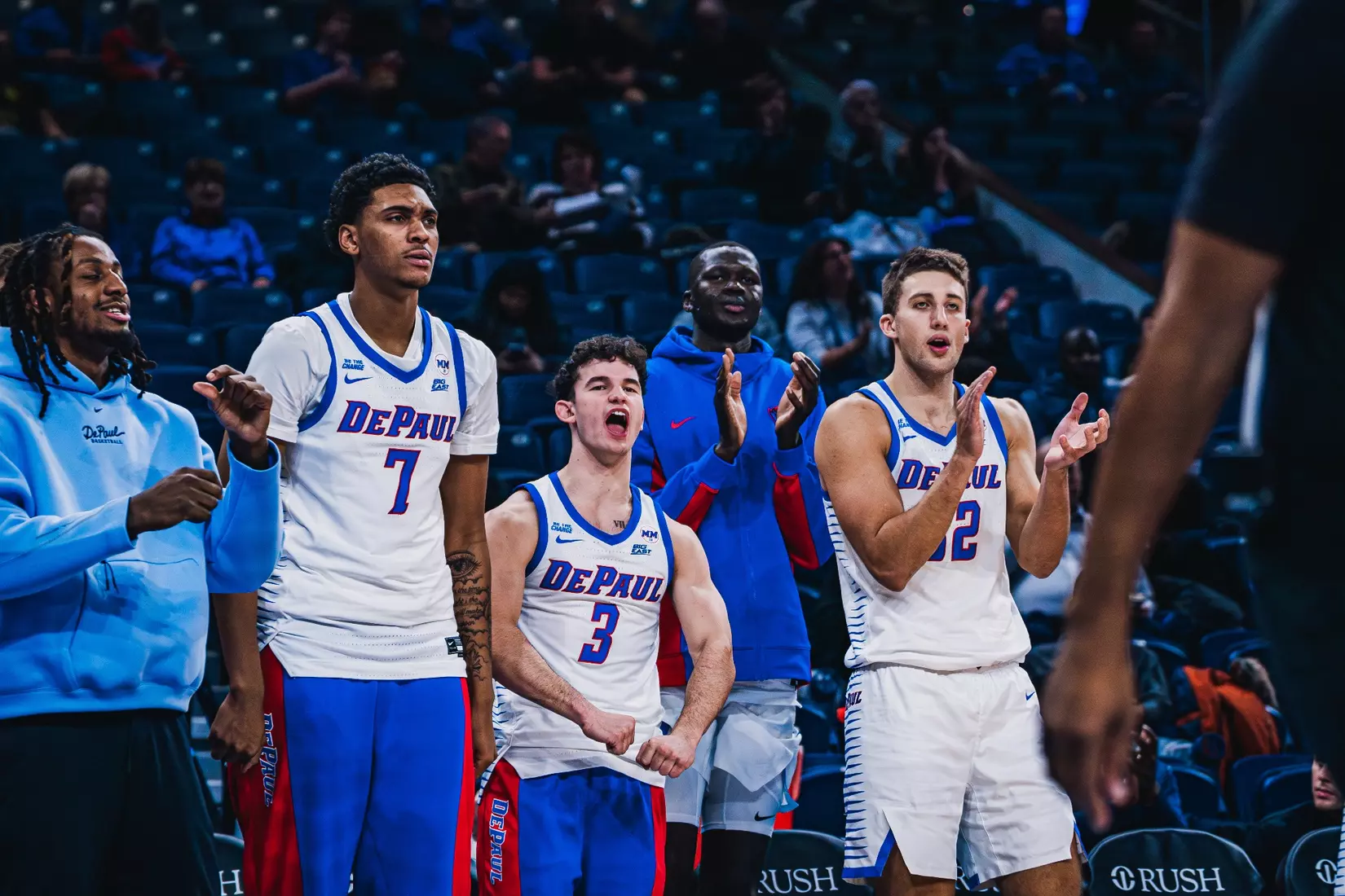 Brandon Maclin, Isaiah Medina, Nate Kasher, Khaman Maker, and Jeremy Lorenz celebrate.