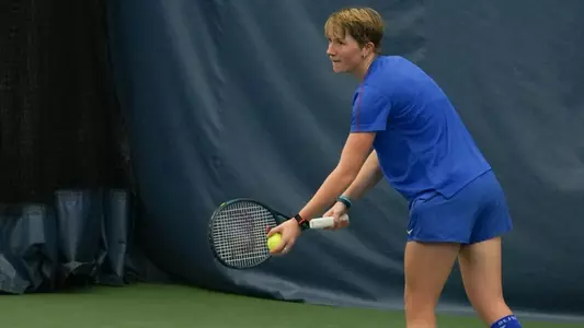 Hannah smith prepares to serve
