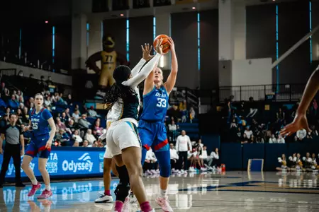 Jorie Allen takes a shot against Marquette