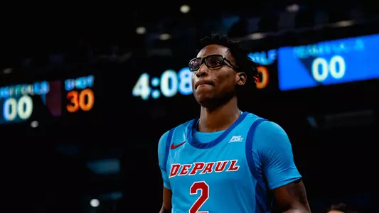 Layden Blocker runs out onto court