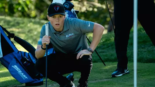 billy gneiser looks to line up a shot