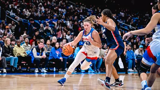 Jorie Allen dribbles
