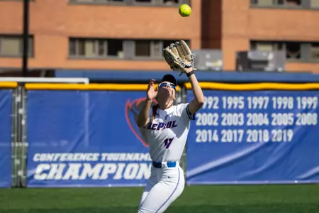 Lexi Houge catches a ball in the infield