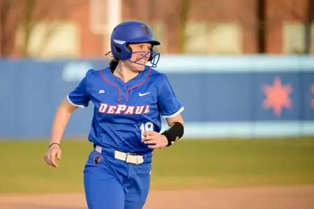 Zoe Levine rounds the bases after a home run