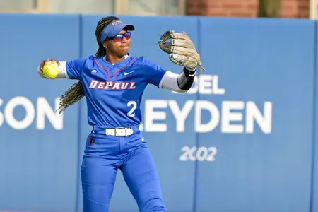 Morgan Rogers throws a softball