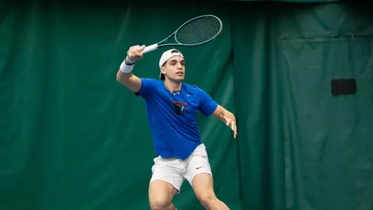 Matteo Iaquinto returns a ball in singles vs. Villanova
