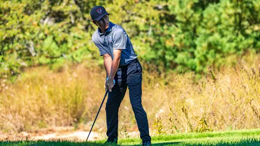 dominic lucchesi sets up for a golf swing