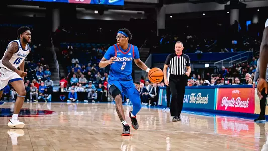 Layden Blocker looks for a pass as he dribbles