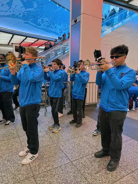 The DePaul band performs at Penn Station prior to the BIG EAST tournament