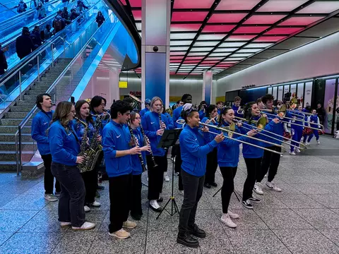 The DePaul band performs at Penn Station prior to the BIG EAST tournament