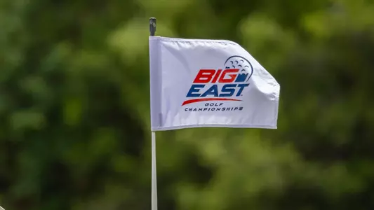 golf course flag that says "BIG EAST Golf Championship"