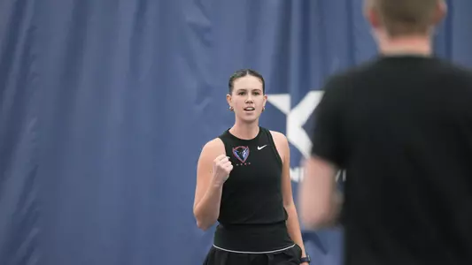 Eva Goncharov fist pump with Hannah Smith in foreground
