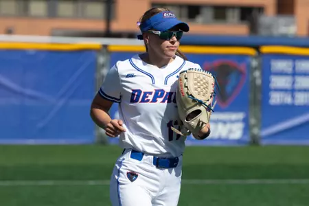 Alexis Houge runs in from the outfield