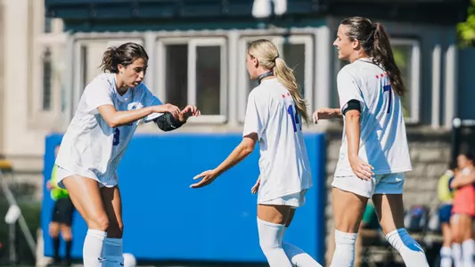 Kate Jamie high fives Shayna da Silva