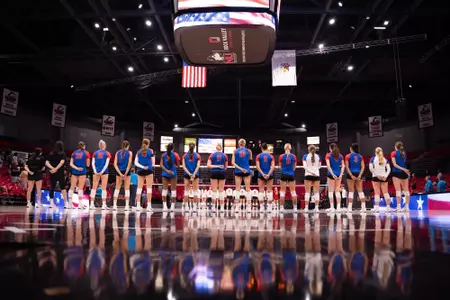 DePaul volleyball during introductions at NIU 2025