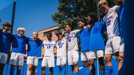 Men's Soccer pregame huddle