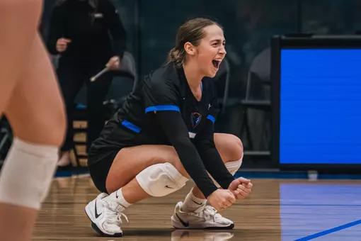 Eva Hurrle celebrates with her team after a point