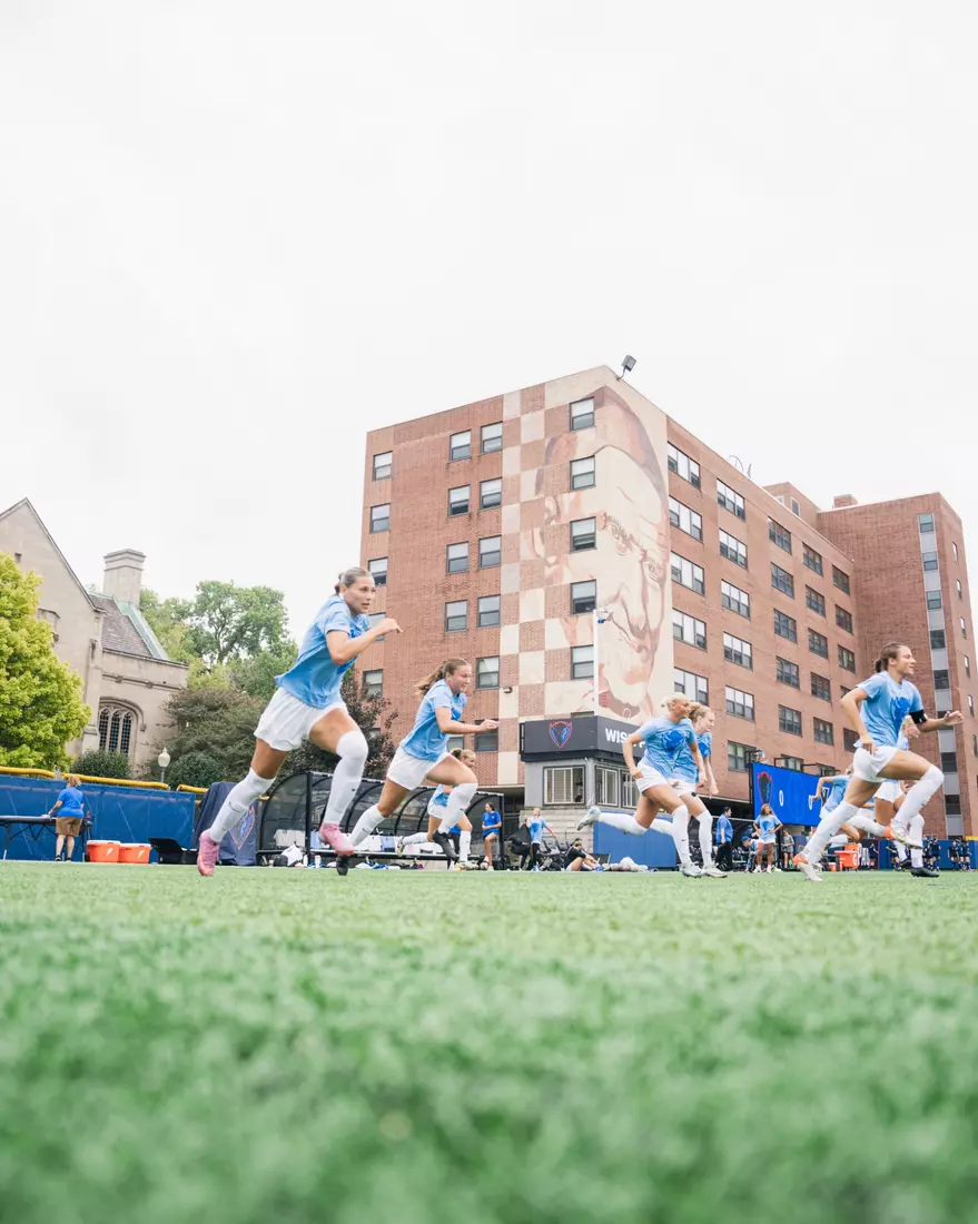 The squad warms up to face off against Xavier.